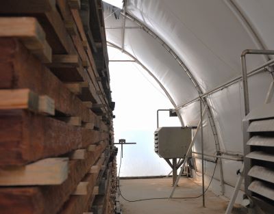 Hardwood framing timber inside a kiln